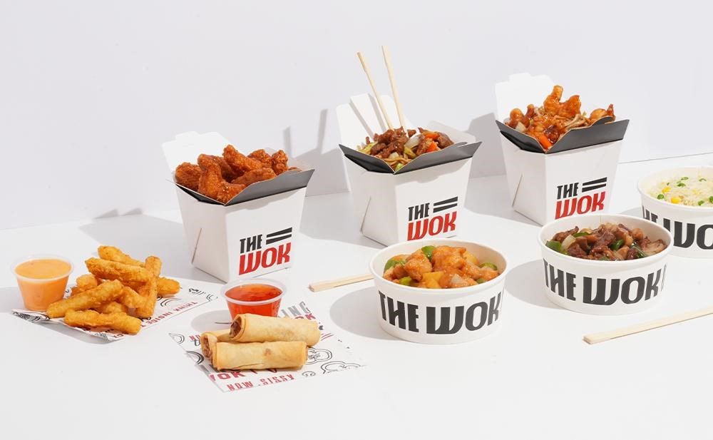 The Wok noodle boxes, bowls, spring rolls and crispy chicken